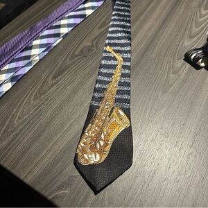 Renaissance. Stylish Black and Gold Saxophone Tie